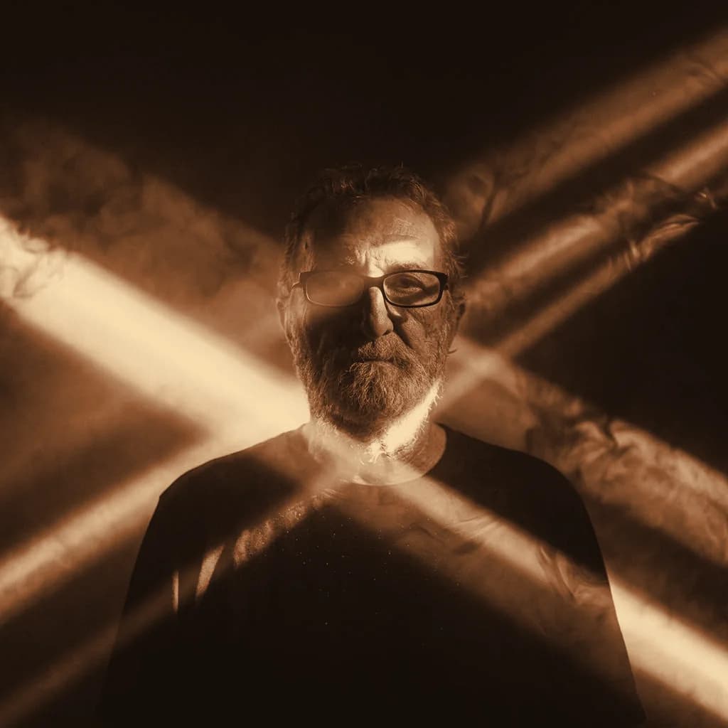 Author Duane Reynolds in dramatic golden light